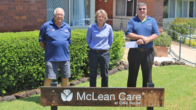 Micheal Carpenter from the Bernborough Tavern presents a cheque to McLean Care.